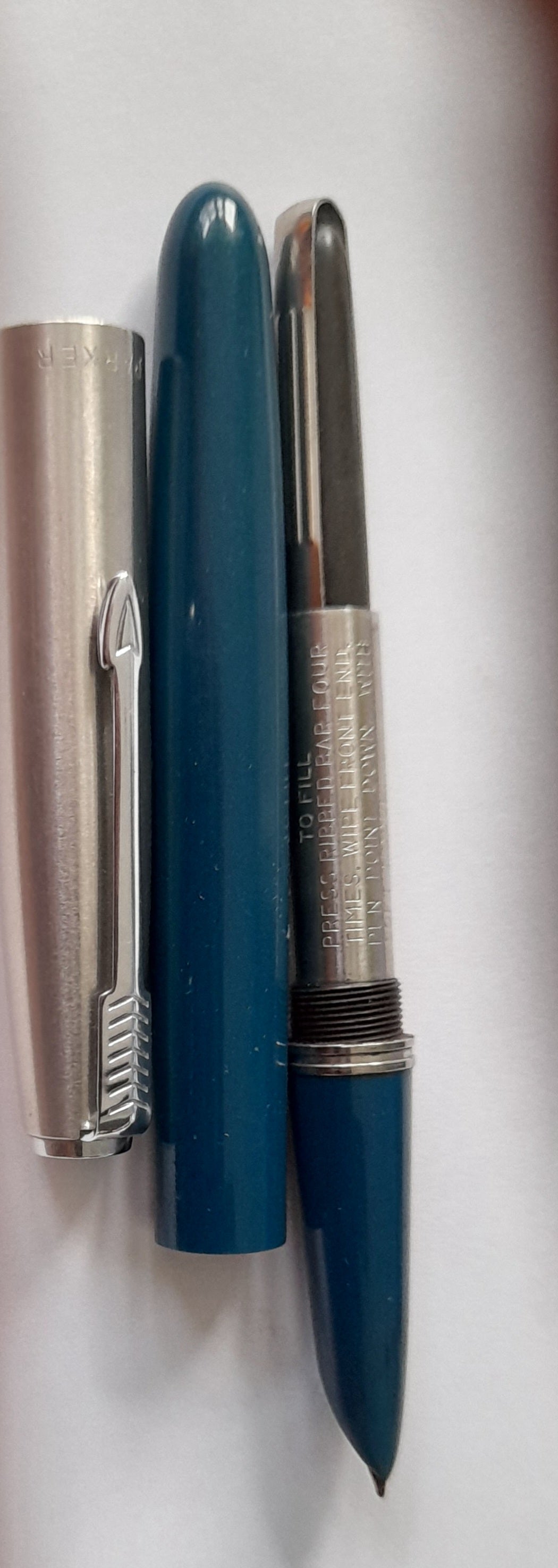 Parker 51 Silveralloy Cap and Forced Green Body fountain Pen.
